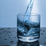 Drinking Water - Fluid Pouring in Pint Glass